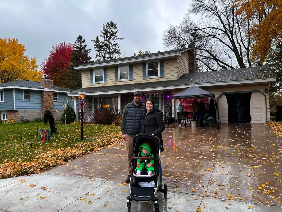 A family with a stroller visiting the displays